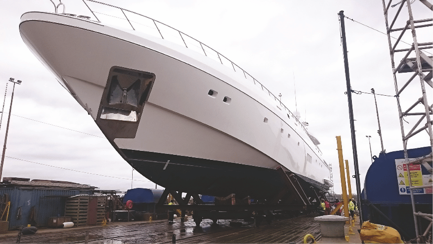 A picture containing a supreme outdoor ship drydocking for ship maintenance and cleaning