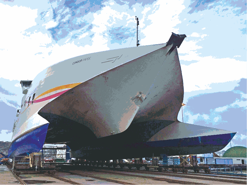 A picture displaying the underside of a large ship hull being drydocked