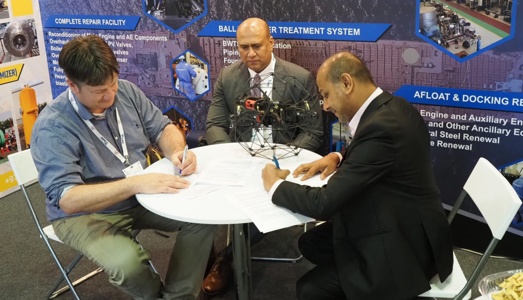 David Knukkel, CEO of Global Drone Inspection (left), Sunny Rajan, Sales Director of JOME (centre), Mustafa Zaveri, Managing Director of JOME (right) signing the contract 