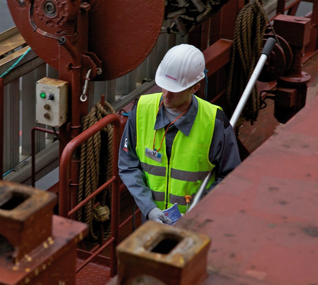 A service man carrying out an inspection in the port of Bremerhaven